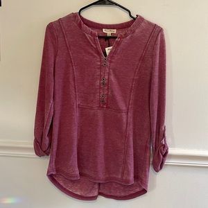 Women’s dark pink faed wash button top.